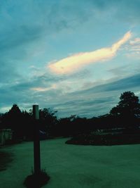 Scenic view of landscape against cloudy sky