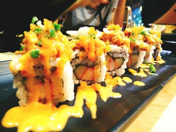 Close-up of sushi served on table