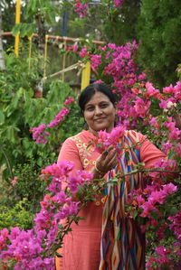 Indian woman between flowers