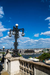 View of buildings against blue sky