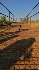 View of suspension bridge against clear sky