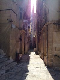 Narrow alley along buildings