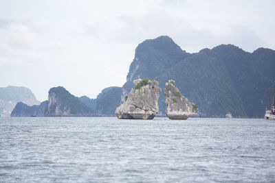 Scenic view of bay against sky