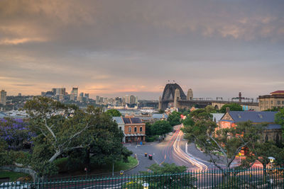 High angle view of city against cloudy sky