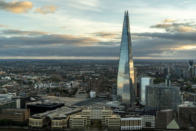 Modern buildings in city against sky