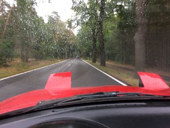 Road seen through car windshield