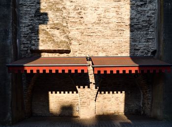 Shadow on wall of old building