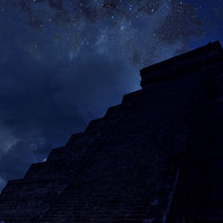 Low angle view of building against sky at night