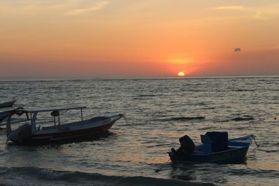 Scenic view of sea at sunset