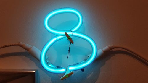Blue light painting on wall