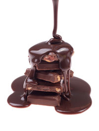 Close-up of chocolate cake against white background