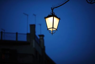 Low angle view of illuminated street light