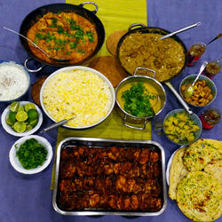 Directly above shot of food served on table