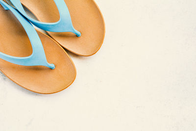 High angle view of slippers on white background