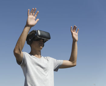 Virtual reality experience young man having a funny moment