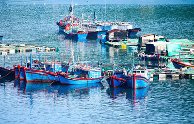 Boats sailing in sea