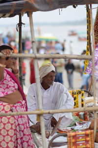 People looking at market stall