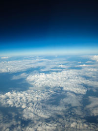 Aerial view of clouds over blue sky