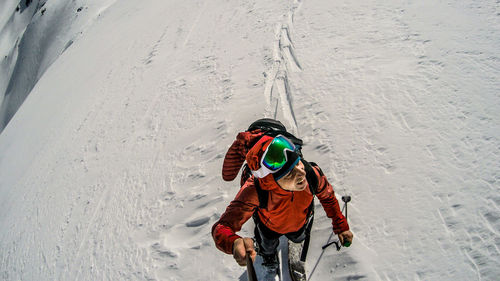 High angle view of umbrella on snow covered land