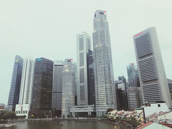 Low angle view of modern buildings against clear sky