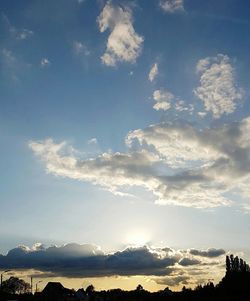 Scenic view of silhouette mountains against sky at sunset