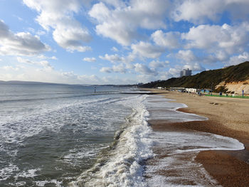 Scenic view of beach against sky