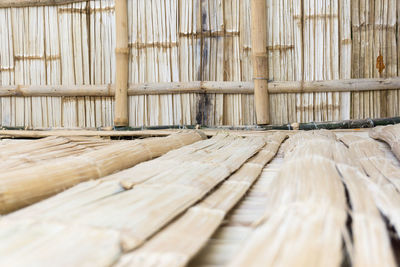 Stack of bamboo on hardwood floor