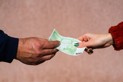 Close-up of woman holding hands