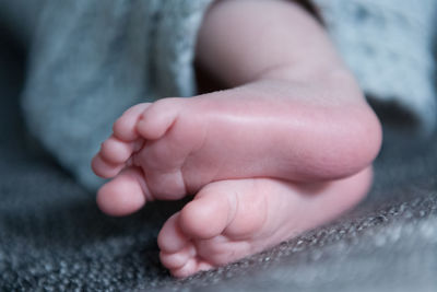 Low section of child on bed