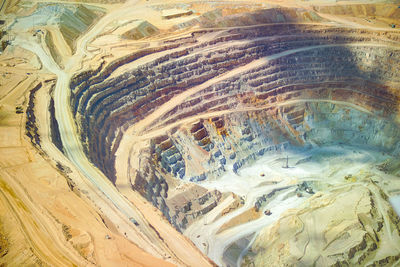 Close-up aerial view of the pit of a copper mine at the altiplano of the atacama desert in chile