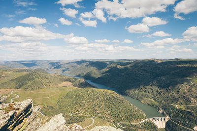 Lake along countryside landscape