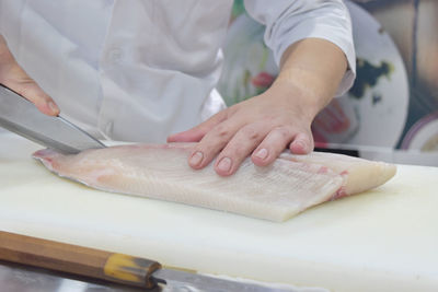 Close-up of person preparing food