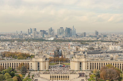 High angle view of buildings in city against sky