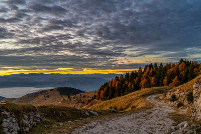 Scenic view of landscape against sky during sunset