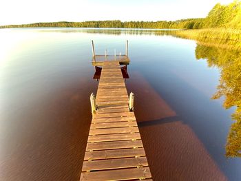 High angle view of pier over lake against sky