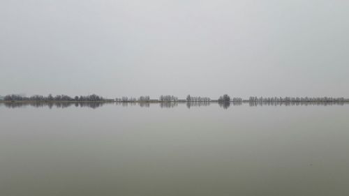 Scenic view of lake against clear sky