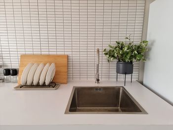 Potted plants on table at home