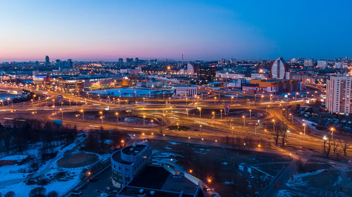 High angle view of illuminated city at night