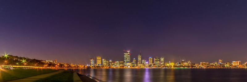 Illuminated cityscape at night