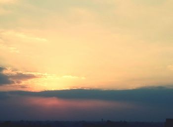 Scenic view of dramatic sky during sunset