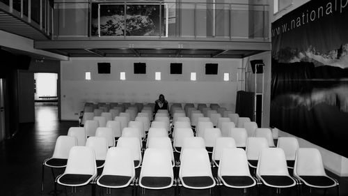 Empty chairs and tables in stadium