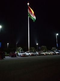 Illuminated flags at night