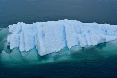 Ice floating on water in lake