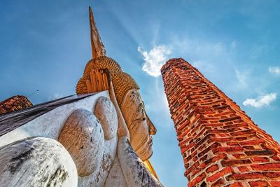 Low angle view of temple building against sky