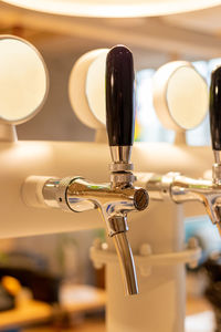 Close-up of faucet in bathroom