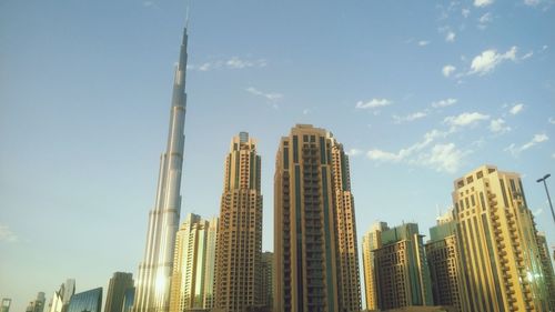 Low angle view of skyscrapers against sky