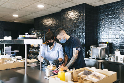 People standing in kitchen