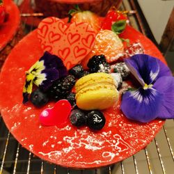 High angle view of strawberries in plate