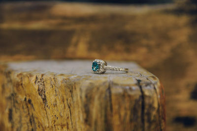 Close-up of wedding rings on rock