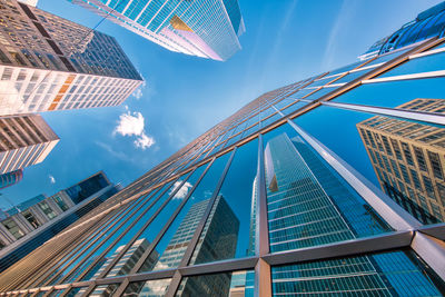 Low angle view of modern buildings against sky